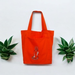 Pomarańczowa torba bawełniana z haftem kobiety