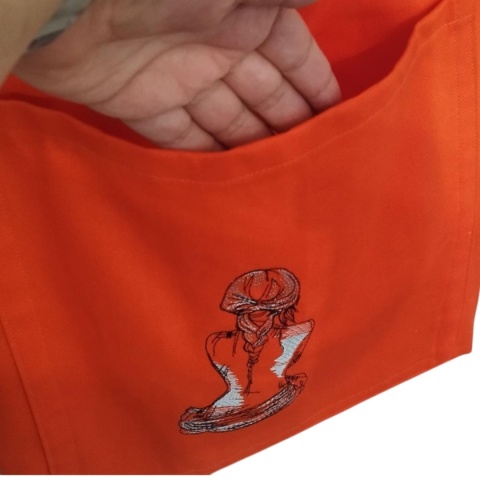 Pomarańczowa torba bawełniana z haftem kobiety